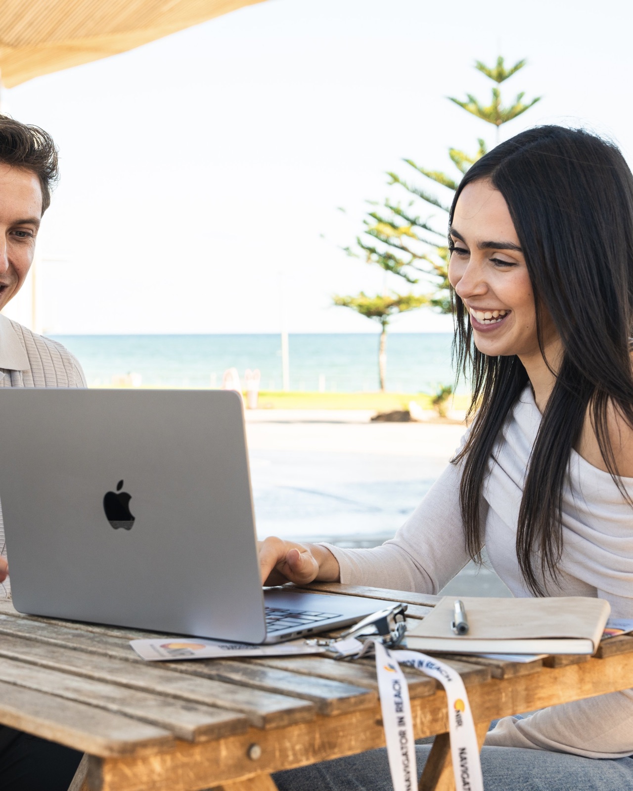 Alicia, founder and support coordinator at Navigator In Reach, with a participant on the Adelaide foreshore